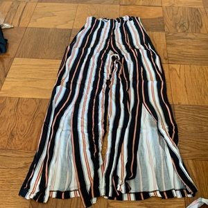 Pants with leg slits